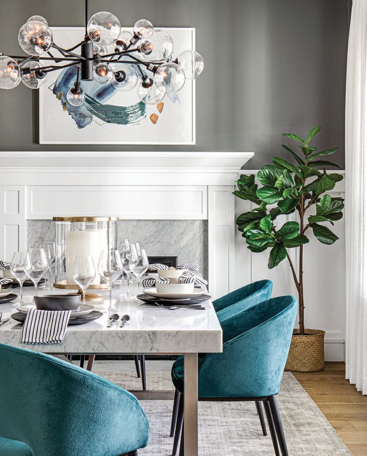 Bold custom dining chairs punctuate this dazzling dining room. PHOTO BY CHAD MELLON