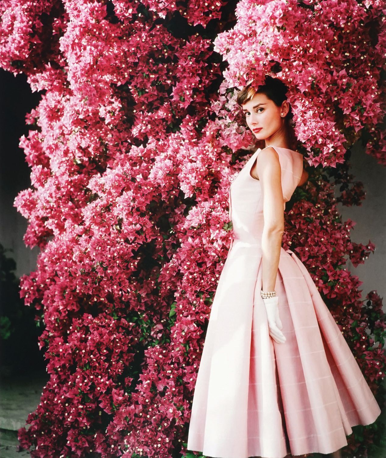 Norman Parkinson, “Audrey Hepburn With Flowers” (1955) PHOTO BY © NORMAN PARKINSON/ICONIC IMAGES, COURTESY OF PETER FETTERMAN GALLERY