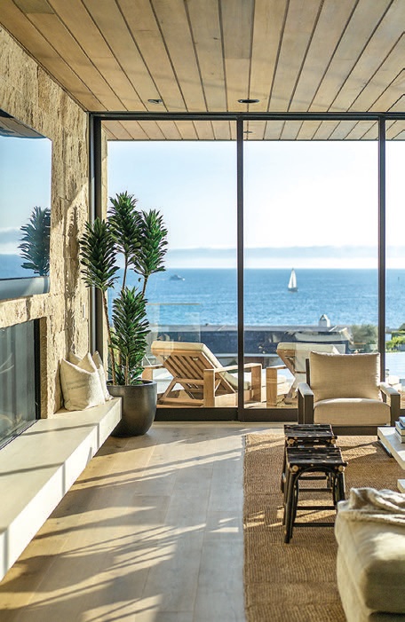 Pacific Ocean views are revealed through the great room’s retractable glass walls.  PHOTOGRAPHED BY MANOLO LANGIS
