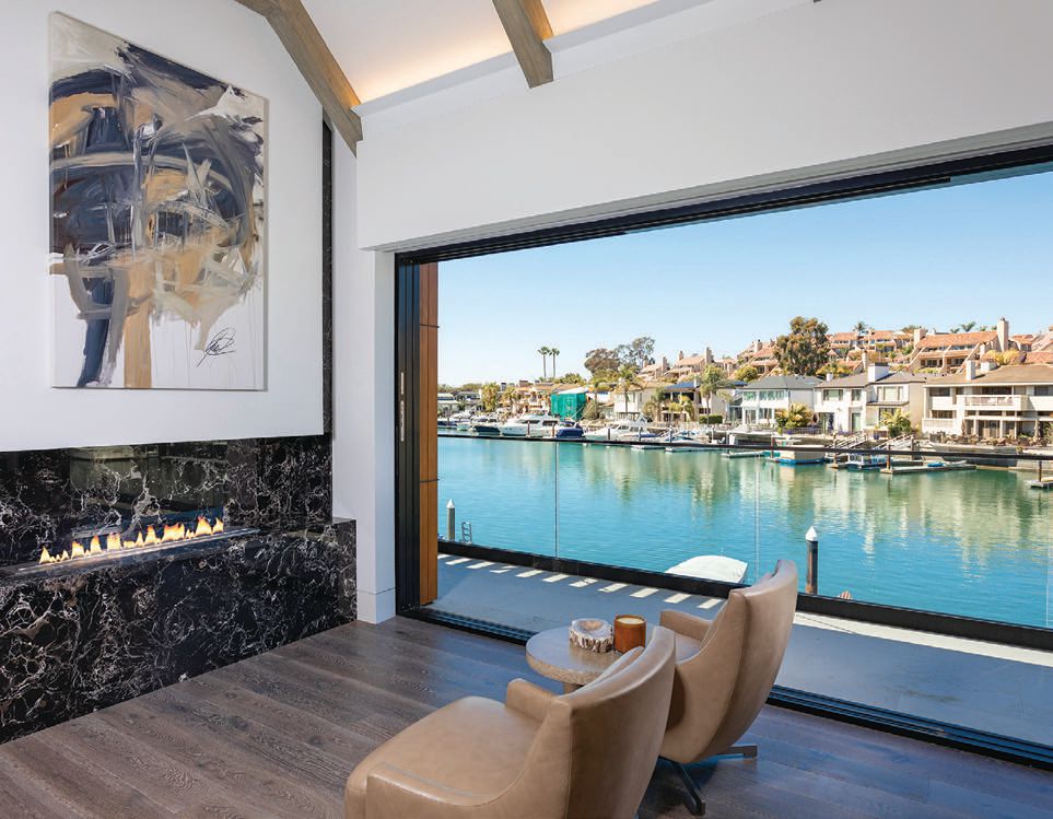 The primary suite opens up to a private waterfront balcony PHOTO BY ADAM DUBICH