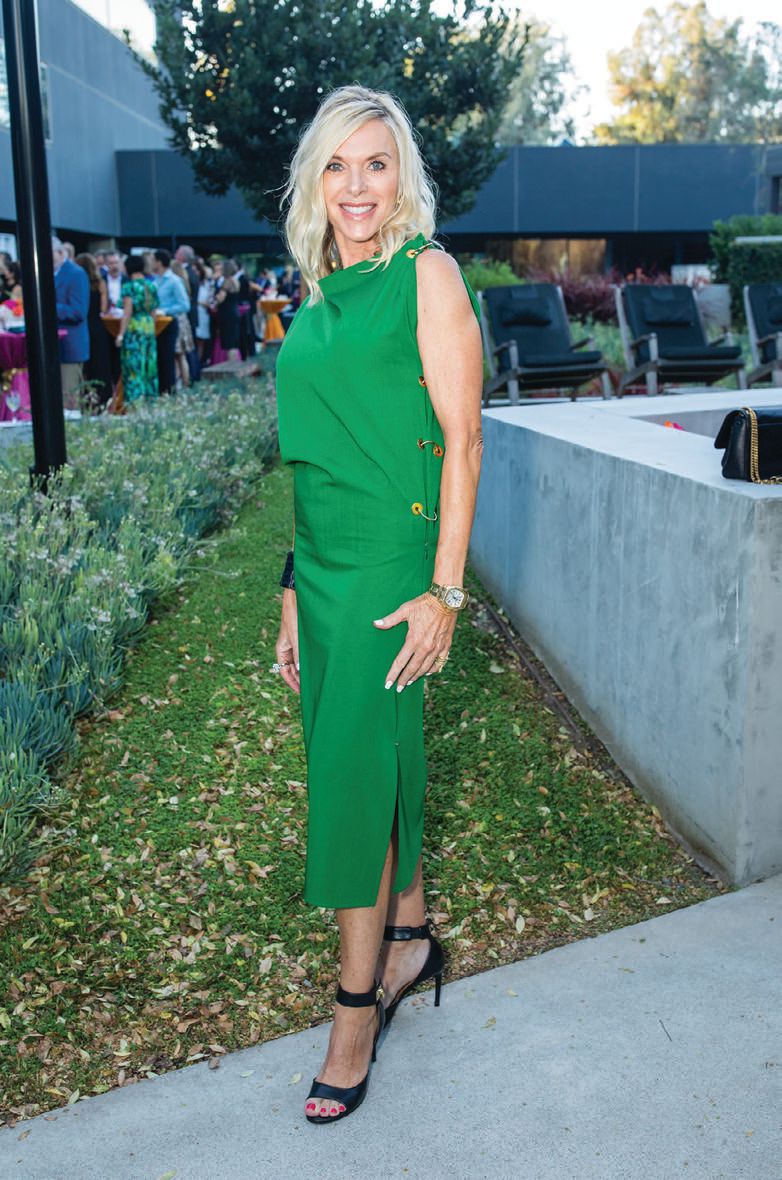 Karen Jordan glowed in green at the 2021 CASA Celebration of Children. PHOTO BY JOHN WATKINS