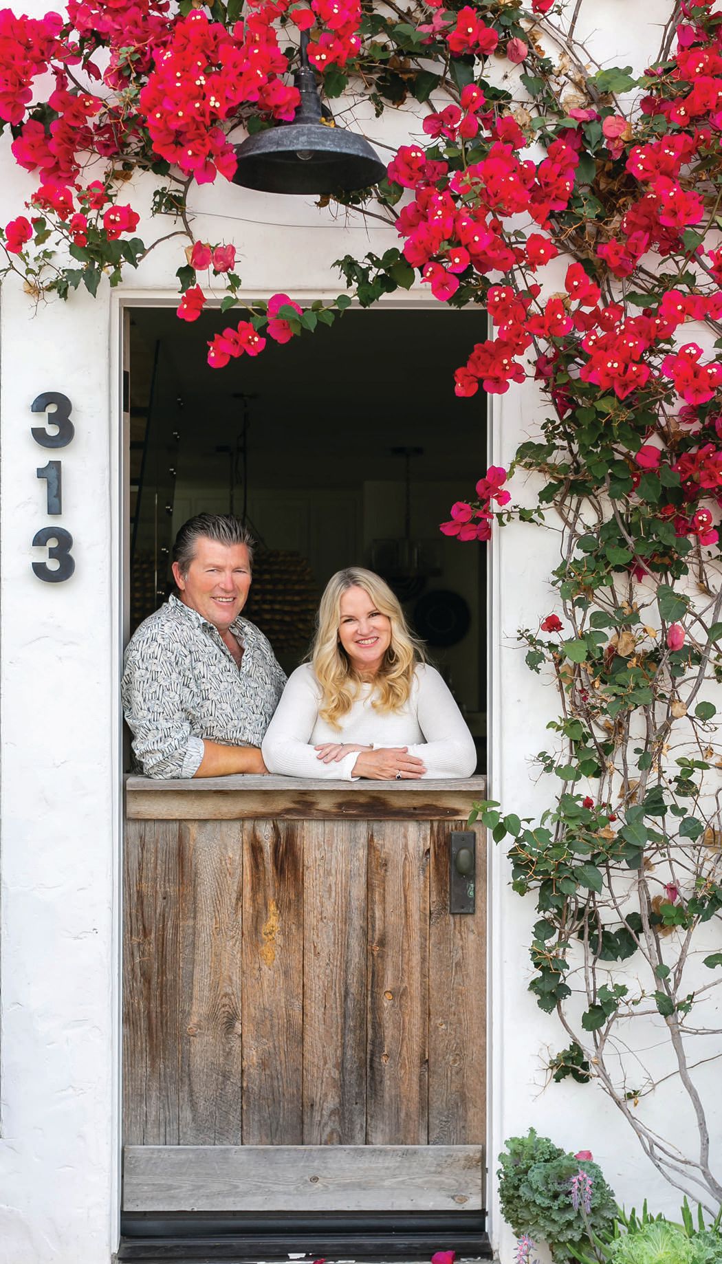 Wendy and Greg Blackband added white stucco, a Dutch door and bougainvillea vines to their home’s exterior. PHOTOGRAPHED BY RYAN GARVIN