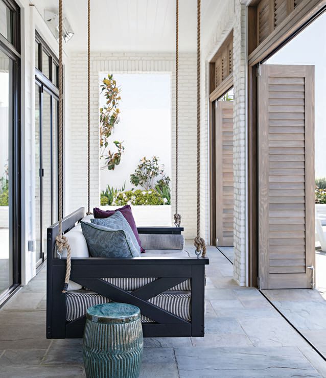 An oversize outdoor swing provides the perfect perch to take in the ocean view PHOTOGRAPHED BY KARYN MILLET
