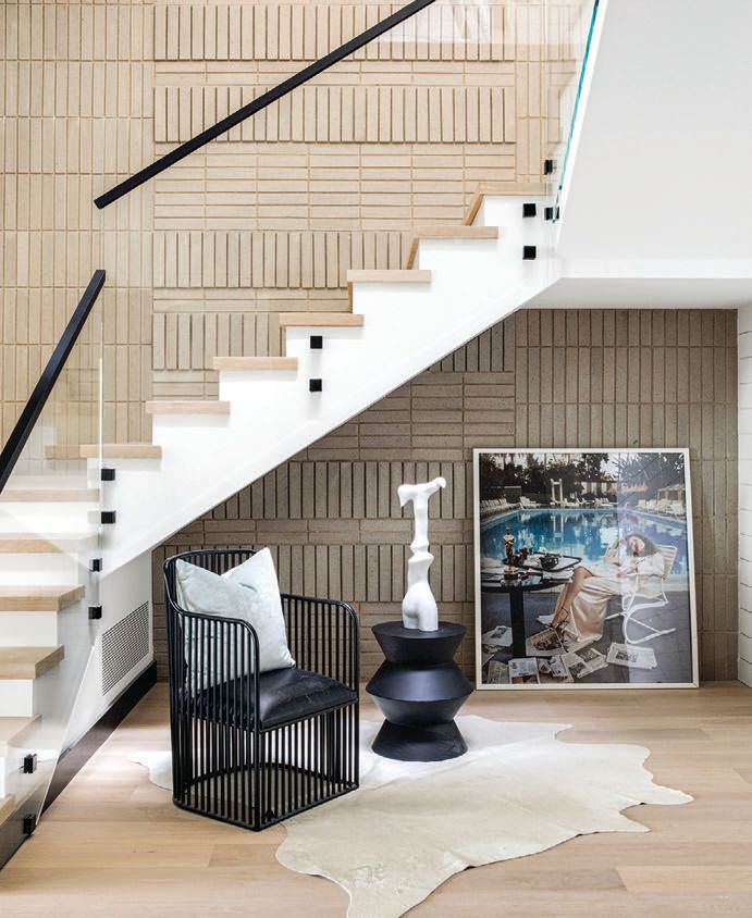 A gray brick feature wall flaunts a three-dimensional pattern PHOTO BY CHAD MELLON